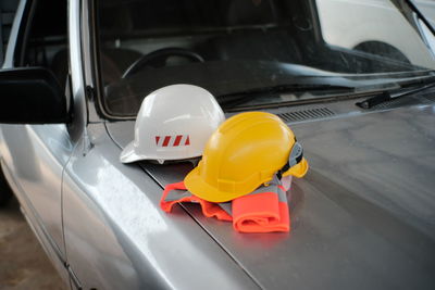 Close-up of car on road