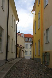 Narrow alley with buildings in background