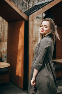 Young beautiful woman with long hair enjoying springtime.