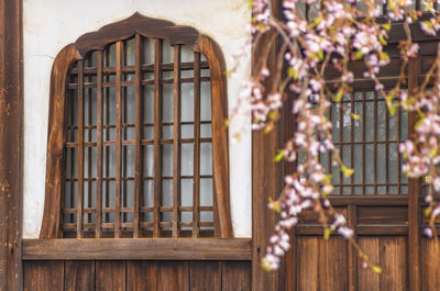 Close-up of metal grate on window of building