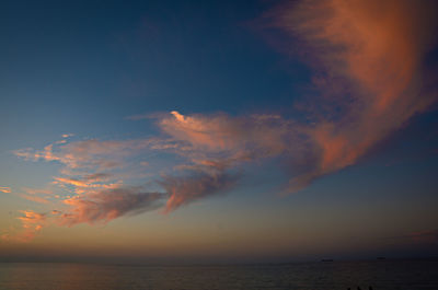 Scenic view of sea against sky at sunset