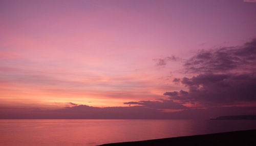 Scenic view of sunset over sea