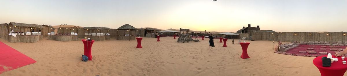 Panoramic view of beach against clear sky