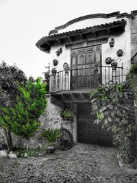 Low angle view of house against building