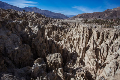 Panoramic view of rocky mountains against sky
