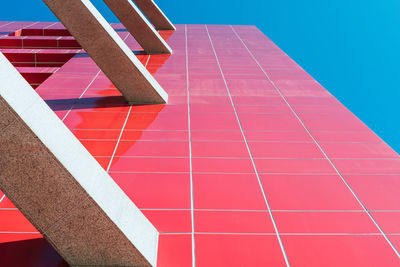 Low angle view of building against blue sky