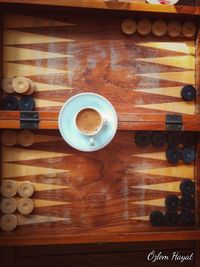 Directly above shot of coffee cup on table