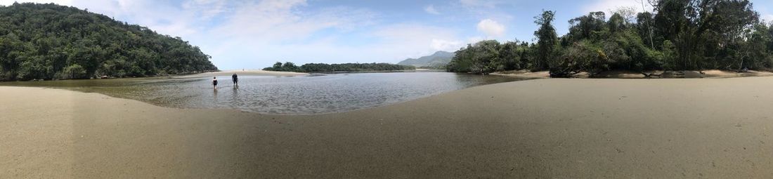 Panoramic view of beach against sky