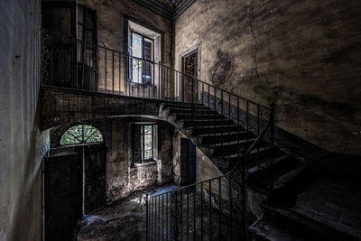 Staircase and windows in abandoned building 