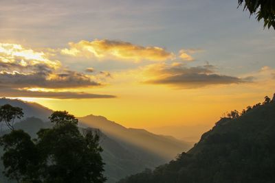 Scenic view of dramatic sky during sunset