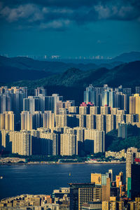 Aerial view of cityscape against sky