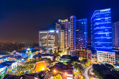 Illuminated cityscape at night