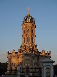 Low angle view of historical building against blue sky
