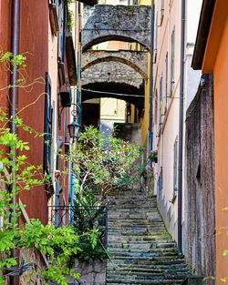 View of alley amidst buildings