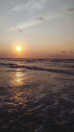 Scenic view of sea at sunset