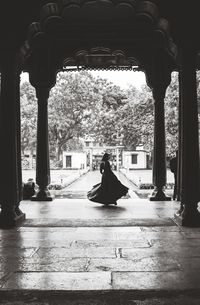 Woman dancing in historic palace