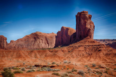 Rock formations against blue sky