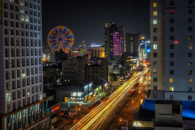 Ulsan downtown at night view with the big lotte department ferris wheel. taken in ulsan, south korea