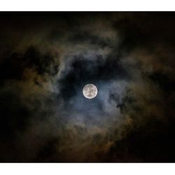 Low angle view of moon in sky