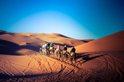 Scenic view of desert against clear sky