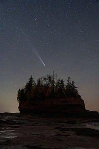 View of comet c2023 a3 from the sea floor at low tide in the bay of fundy