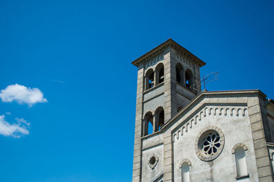 Low angle view of church against blue sky