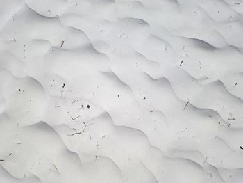 High angle view of footprints on sand