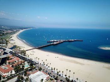 High angle view of beach and sea against sky