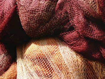 Close-up of used colorful fishing net.