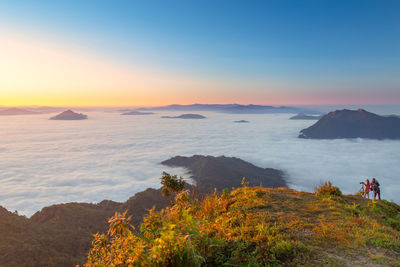 Scenic view of mountains against sky during sunset