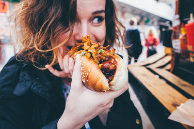 Close-up of hand holding food