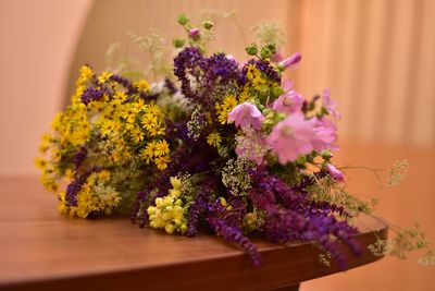 Close-up of purple flowering plant on table