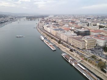 High angle view of river amidst buildings in city