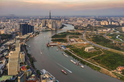 High angle view of river amidst buildings in city