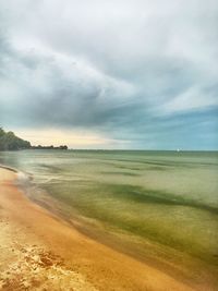 Scenic view of beach against sky