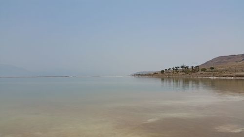 Scenic view of sea against clear sky