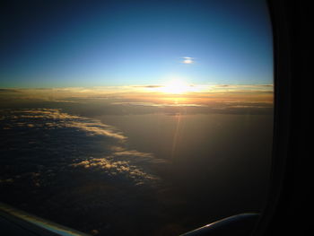 Sunset seen through airplane window