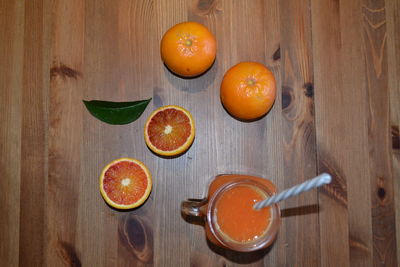 Orange fruits on wood