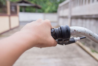 Close-up of person hand holding water