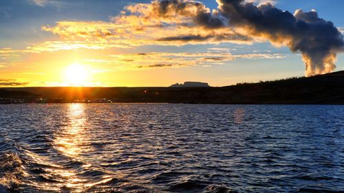 Scenic view of sea against sky during sunset