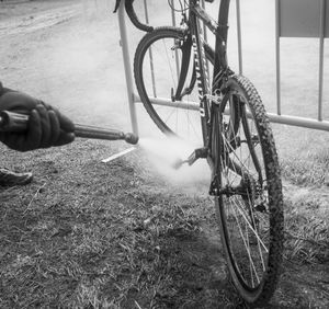 Man riding bicycle on field