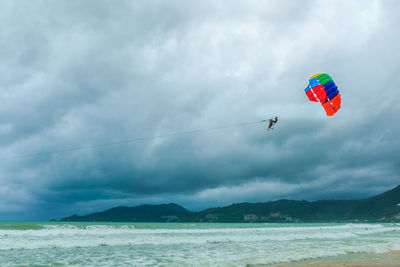Scenic view of sea against cloudy sky
