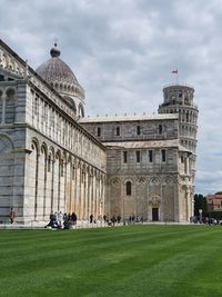 Low angle view of pisa tower and cathedral