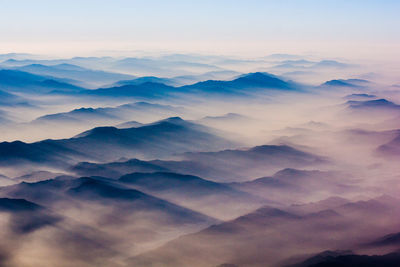 Scenic view of mountains against sky during sunset