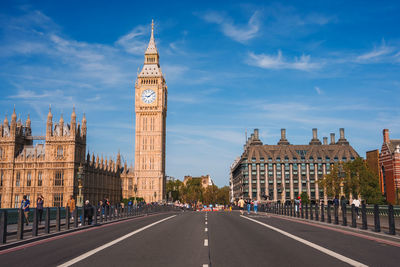 Low angle view of buildings in city against sky