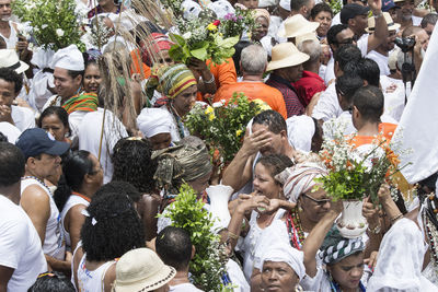 Group of people against plants