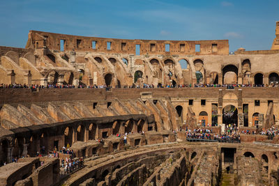 View of the seating areas and the hypogeum of the ancient colosseum in rome