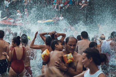 Group of people at swimming pool