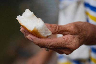 Close-up of man holding ice cream