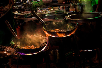 High angle view of burning candle